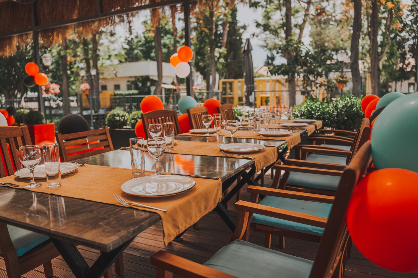 Colorful birthday dinner table set outdoors